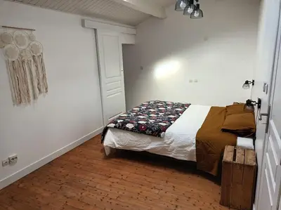 Un ou plusieurs lits dans un hébergement de l'établissement Gîte 80 m2 au calme et 20 mn de la mer