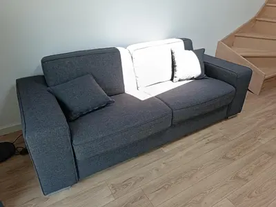 Coin salon dans l'établissement Le petit duplex des barres