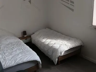 Un ou plusieurs lits dans un hébergement de l'établissement Appart vue sur mer, 2CH 4/6p parking privé