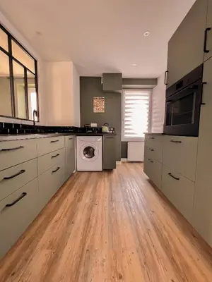 Cuisine ou kitchenette dans l'établissement Au Roupillon du Canal