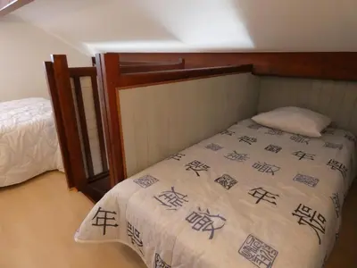 Un ou plusieurs lits dans un hébergement de l'établissement Maison avec Piscine et Wifi à Notre-Dame-de-Monts - 5 pers. - FR-1-540-289