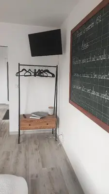 Télévision ou salle de divertissement dans l'établissement Studio mer