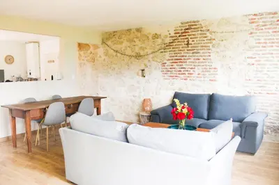 Coin salon dans l'établissement Gîte le Puy Pin, 4 personnes