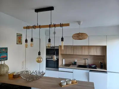 Cuisine ou kitchenette dans l'établissement La Piastre Location à la semaine