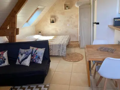 Coin salon dans l'établissement Studio Cosy à la campagne