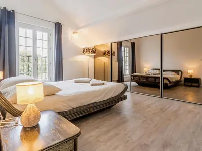 Un ou plusieurs lits dans un hébergement de l'établissement Maison de charme avec jardin près de Nantes, 4 chambres, wifi, équipements bébé et babyfoot - FR-1-306-1272