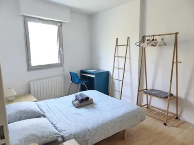 Un ou plusieurs lits dans un hébergement de l'établissement Chézine, T2 au calme avec balcon, 2pers et parking