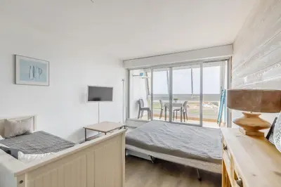 Un ou plusieurs lits dans un hébergement de l'établissement Studio Soleil Couchant - Vue mer