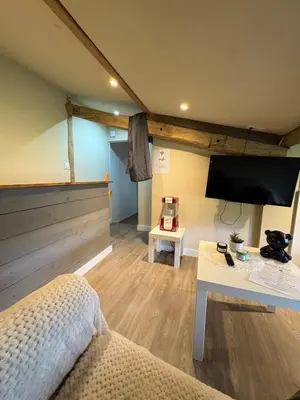 Coin salon dans l'établissement Maison de la barbotine