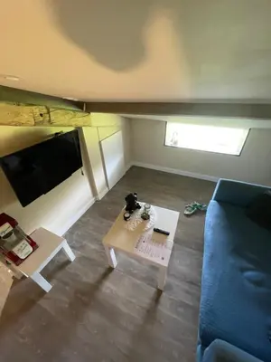 Télévision ou salle de divertissement dans l'établissement Maison de la barbotine