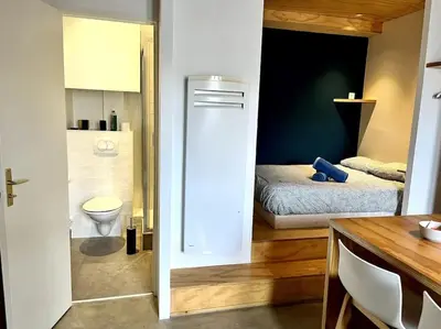 Un ou plusieurs lits dans un hébergement de l'établissement Studio Le Sanlecque, Wifi Tv 2personnes