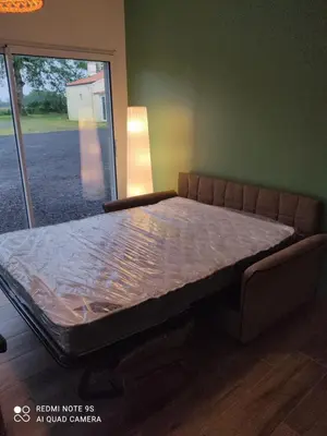 Coin salon dans l'établissement Gîtes des Colombières Piscine & Spa
