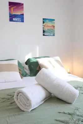 Un ou plusieurs lits dans un hébergement de l'établissement La Petite Maison