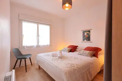 Un ou plusieurs lits dans un hébergement de l'établissement La Petite Maison