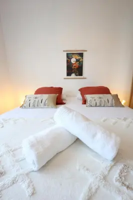 Un ou plusieurs lits dans un hébergement de l'établissement La Petite Maison