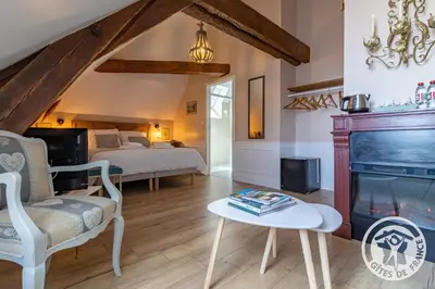 Coin salon dans l'établissement Chambres d'hôtes Le Griffon 1855