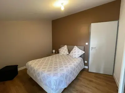 Un ou plusieurs lits dans un hébergement de l'établissement Gîte de 2 chambres - Ancenis A11 - Logis du Château Rouge
