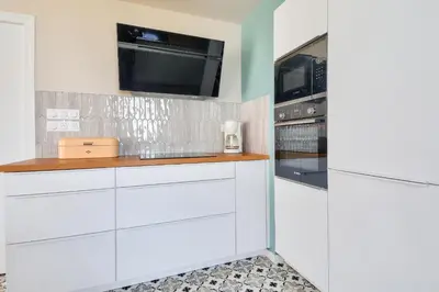 Cuisine ou kitchenette dans l'établissement maison neuve- 6 adultes & 4 enfants - 350m plage