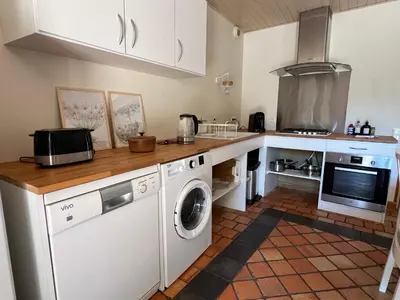 Cuisine ou kitchenette dans l'établissement La Millière - Piscine & campagne - Céleste