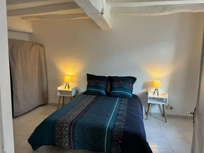 Un ou plusieurs lits dans un hébergement de l'établissement Appartement Situé au cœur de Brissac-Quincé