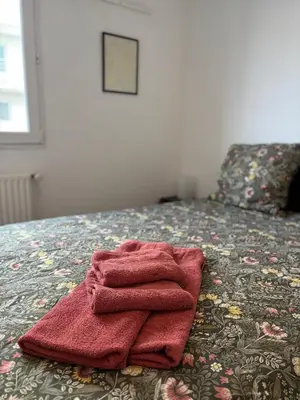 Un ou plusieurs lits dans un hébergement de l'établissement Apartment Nantes Erdre - 3 bedrooms, Parc des Expositions