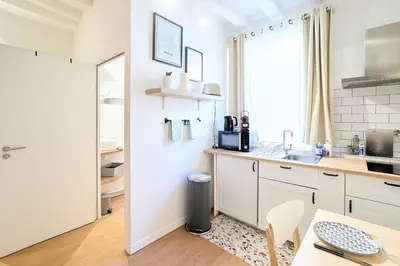 Cuisine ou kitchenette dans l'établissement La Suite des Carmes - Studio cosy