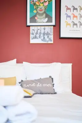 Un ou plusieurs lits dans un hébergement de l'établissement La Suite des Carmes - Studio cosy