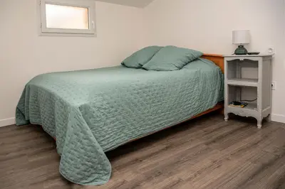 Un ou plusieurs lits dans un hébergement de l'établissement Cottage tout confort neuf au calme 6p WiFi
