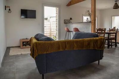Coin salon dans l'établissement Cottage tout confort neuf au calme 6p WiFi