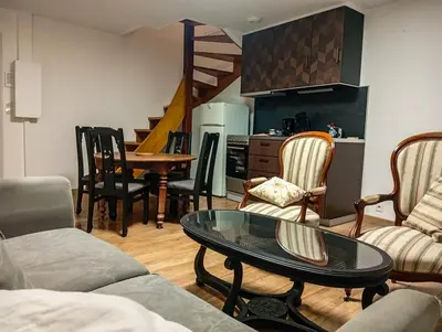 Cuisine ou kitchenette dans l'établissement Duplex vue sur château