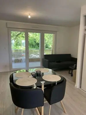 Coin salon dans l'établissement Appartement proche gare et centre-ville