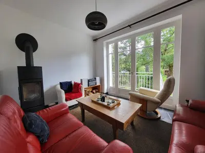 Coin salon dans l'établissement Charmante maison balnéaire pour 6, près de la plage, animaux admis - FR-1-364-172