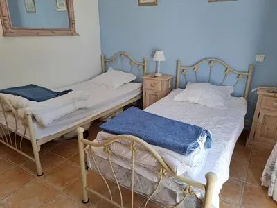 Un ou plusieurs lits dans un hébergement de l'établissement Belle villa avec piscine dans quartier calme à Saint-Jean-de-Monts - FR-1-323-542