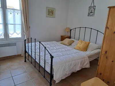 Un ou plusieurs lits dans un hébergement de l'établissement Belle villa avec piscine dans quartier calme à Saint-Jean-de-Monts - FR-1-323-542
