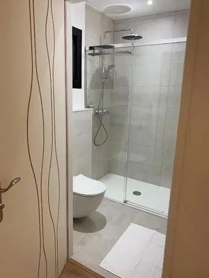 Salle de bains dans l'établissement La Maison Blanche
