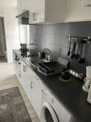 Cuisine ou kitchenette dans l'établissement Lazare Home