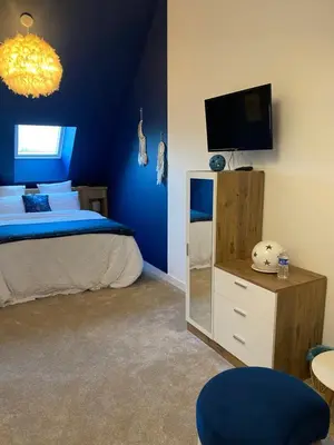 Télévision ou salle de divertissement dans l'établissement Lady Jule Chambres d hôtes & spa