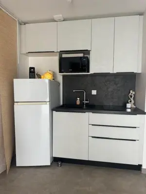 Cuisine ou kitchenette dans l'établissement La Lumière du Coeur