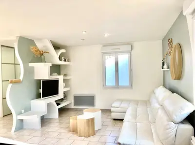 Coin salon dans l'établissement Maison spacieuse avec jardin à 25min des Sables