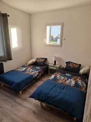 Un ou plusieurs lits dans un hébergement de l'établissement villa spacieuse avec piscine, jacuzzi