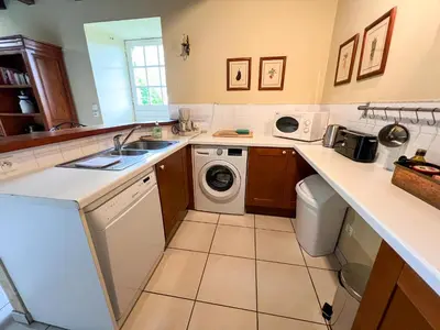 Cuisine ou kitchenette dans l'établissement Gite Vert Maison Bretonne