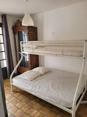 Un ou plusieurs lits dans un hébergement de l'établissement Maison de Vacances Rayons de soleil