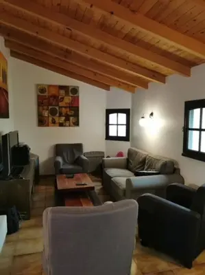 Coin salon dans l'établissement Maison de Vacances Rayons de soleil