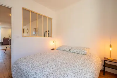 Un ou plusieurs lits dans un hébergement de l'établissement T2 cosy à deux pas de la gare