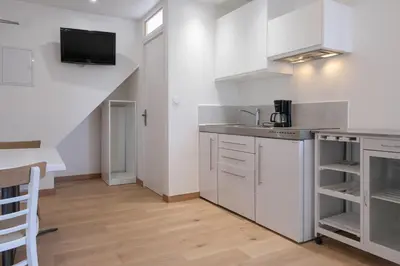 Cuisine ou kitchenette dans l'établissement Appartement Centre ville Mauléon