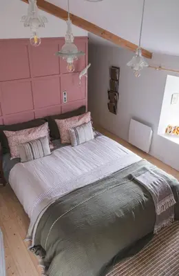 Un ou plusieurs lits dans un hébergement de l'établissement Maison d'hôtes La bien-Aimée