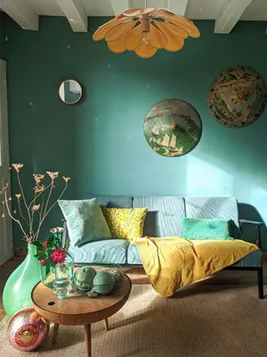 Coin salon dans l'établissement Maison d'hôtes La bien-Aimée