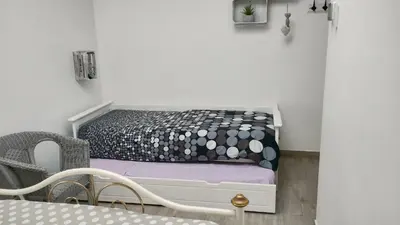 Un ou plusieurs lits dans un hébergement de l'établissement Très belle maison avec SPA extérieur
