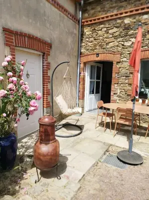 Coin salon dans l'établissement Appartement proche aéroport & indret