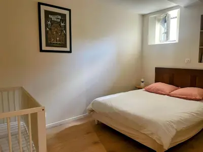 Un ou plusieurs lits dans un hébergement de l'établissement Maison du Chêne